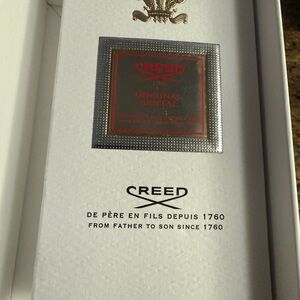Creed White Box with Gold Logo